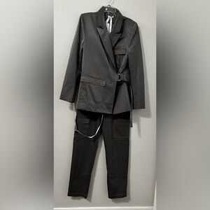 Mistress Rocks 2 piece ‘Dime a dozen’ jacket and ‘Homeward’ trousers. Grey.